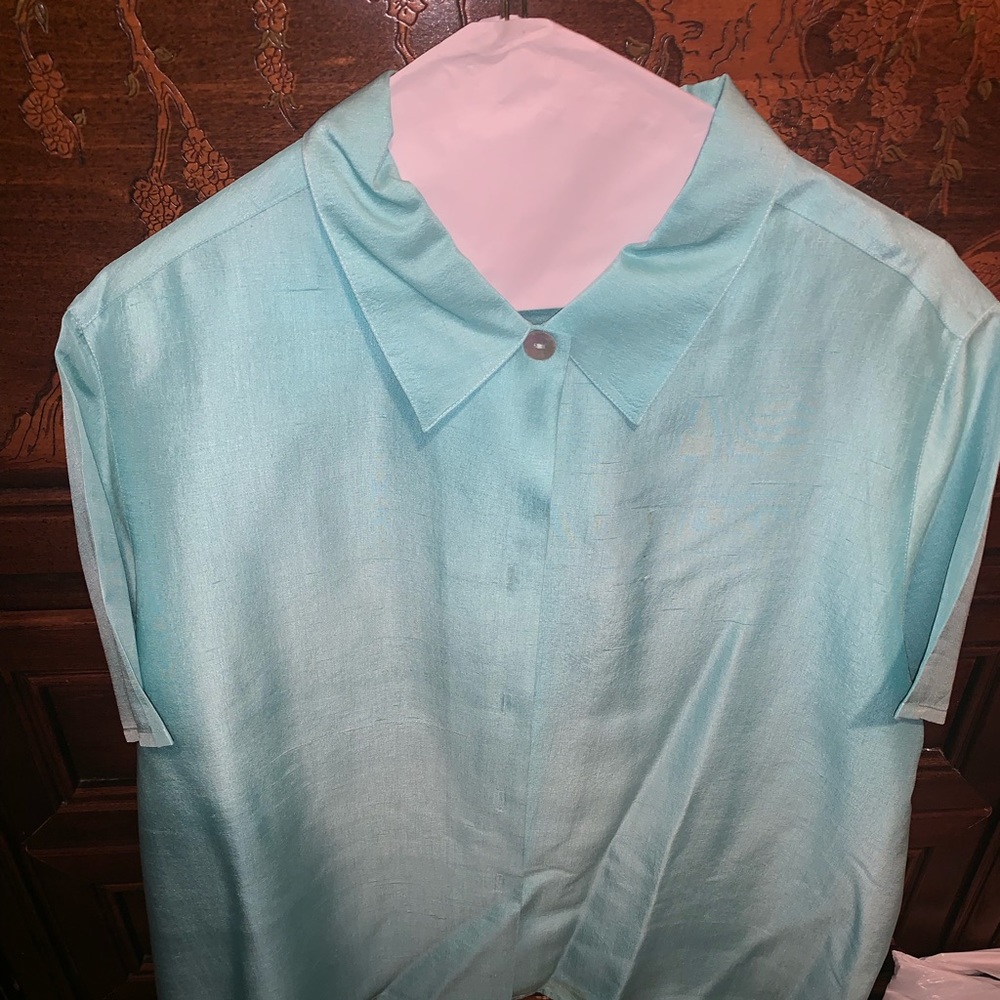 Women’s teal blue shirt